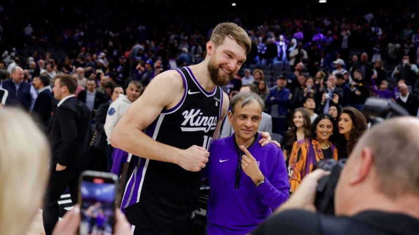Mar 25, 2024; Sacramento, California, USA; Sacramento Kings forward Domantas Sabonis (10) poses for a photo with Kings owner Vivek Ranadive after a game against the Philadelphia 76ers at Golden 1 Center. Mandatory Credit: Sergio Estrada-USA TODAY Sports